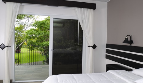 Habitación superior, 1 cama de matrimonio grande, vistas al jardín