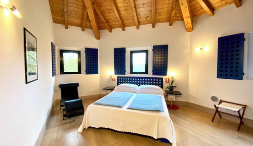 Habitación Deluxe, 1 cama de matrimonio, vistas al jardín, en una planta alta