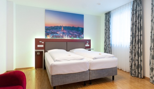 Habitación Confort con 1 cama doble o 2 individuales