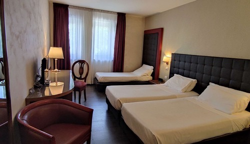 Habitación superior, varias camas