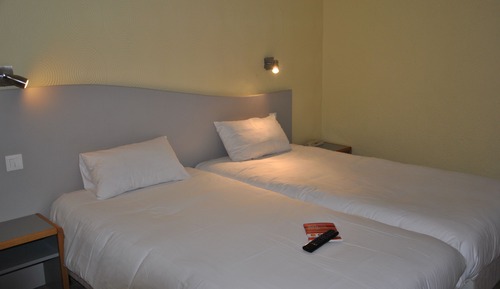 Habitación estándar con 1 cama doble o 2 individuales