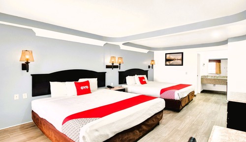 Habitación, varias camas