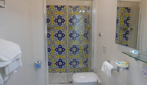Habitación triple, vistas al mar