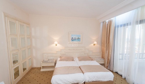 Habitación triple, vistas al mar