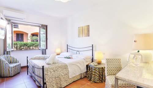 Habitación triple, vistas al mar