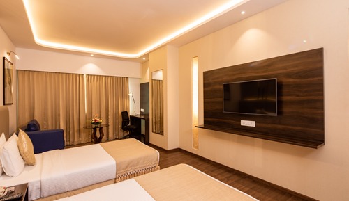 Habitación Club con 1 cama doble o 2 individuales, vistas a la ciudad