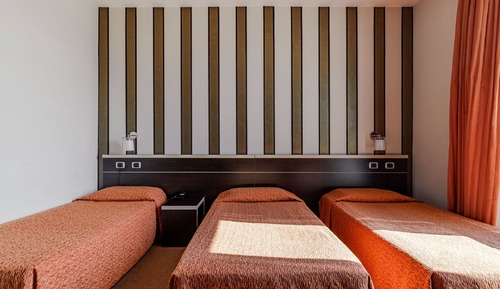 Habitación triple Deluxe