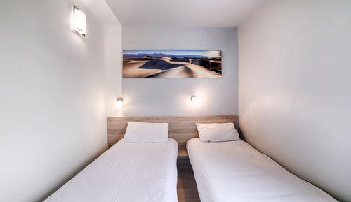 Habitación con 2 camas individuales