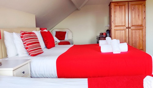 Habitación cuádruple estándar, varias camas