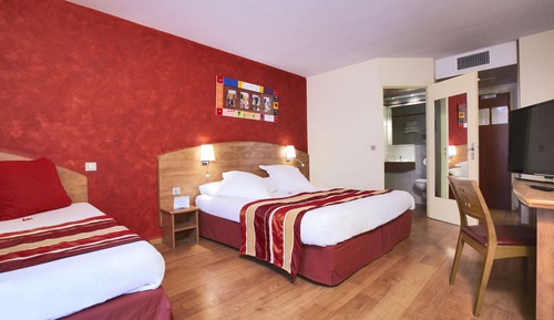 Habitación superior, varias camas
