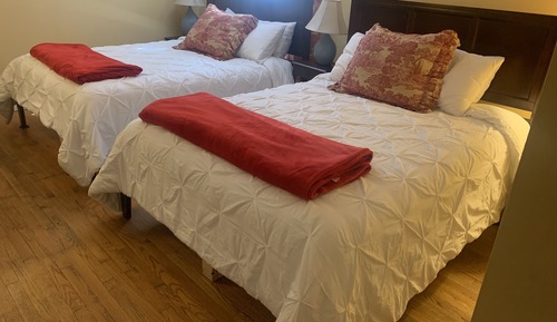 Habitación cuádruple Deluxe, 2 camas de matrimonio, vistas al jardín