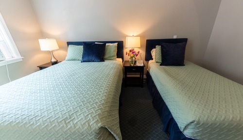 Habitación, varias camas