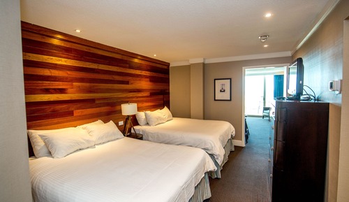 Suite, varias camas, cocina básica, vistas al mar