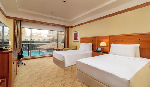 Habitación Premium, 2 camas individuales, Acceso al salón del club, vistas a la piscina