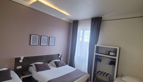 Habitación, varias camas