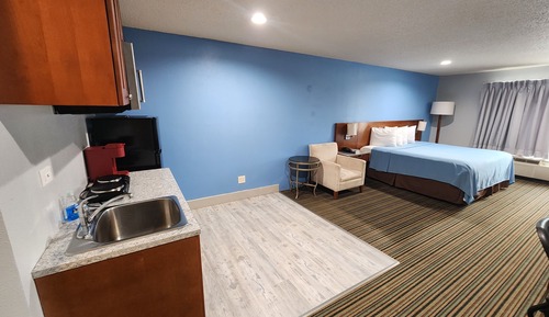 Suite estudio ejecutiva, 1 cama de matrimonio grande, cocina básica
