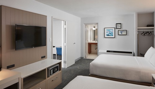 Suite, varias camas, balcón, frente al mar (Balcony)