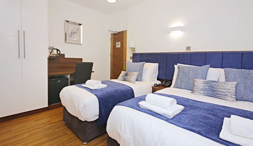 Habitación triple Deluxe, baño privado