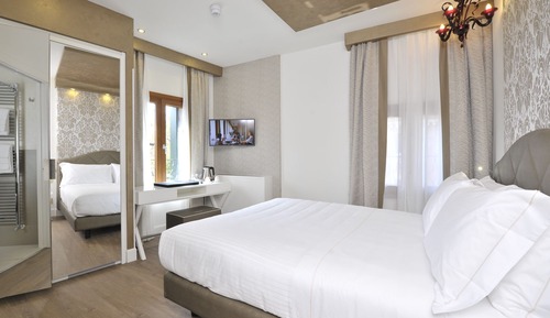 Habitación Confort con 1 cama doble o 2 individuales