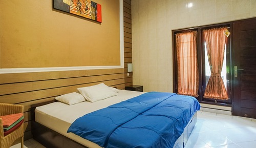 Habitación Deluxe con 1 cama doble o 2 individuales