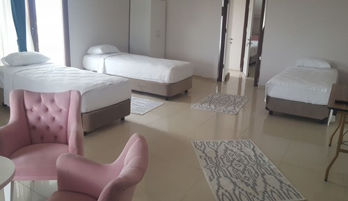 Habitación triple, fumadores