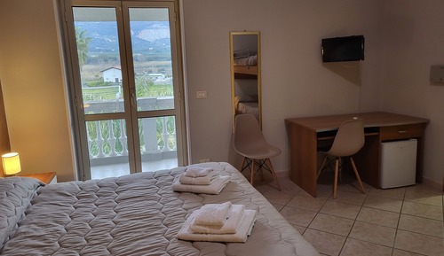 Habitación cuádruple Deluxe, baño privado