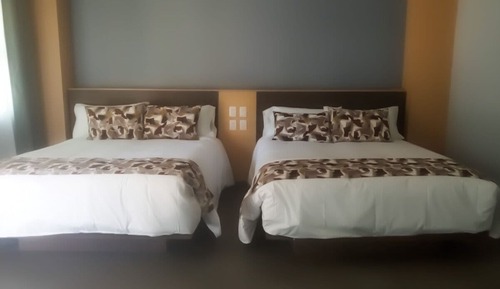 Habitación cuádruple Deluxe