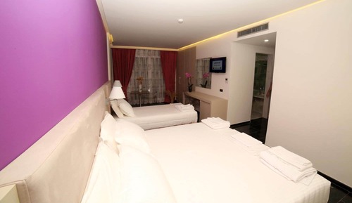 Habitación triple Deluxe