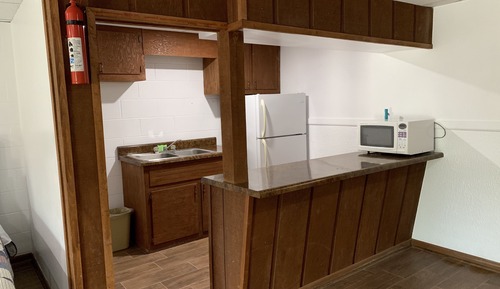 Habitación Deluxe, varias camas, frigorífico y microondas