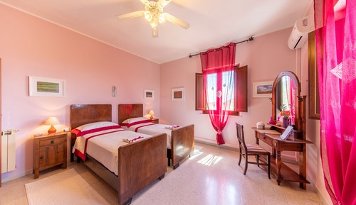 Habitación superior, varias camas
