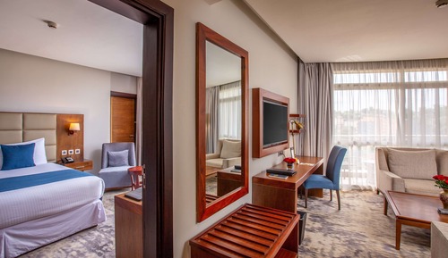 Suite presidencial, varias camas, balcón