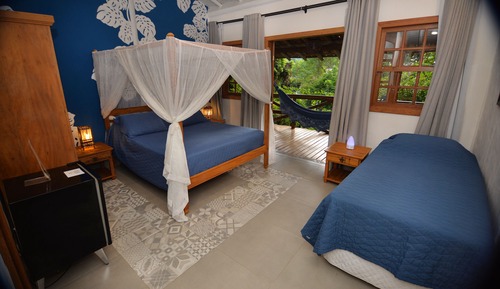 Habitación triple Premium, patio, en la zona del jardín