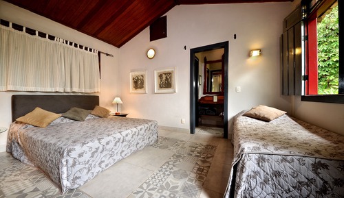 Habitación triple Confort, patio, en la zona del jardín