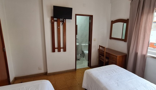 Habitación con 2 camas individuales
