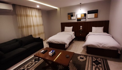 Habitación Elite con 1 cama doble o 2 individuales