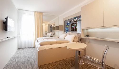 Habitación Deluxe con 1 cama doble o 2 individuales, cocina básica
