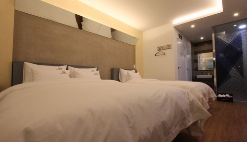 Habitación con 2 camas individuales