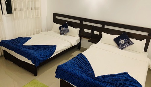 Habitación triple básica, varias camas