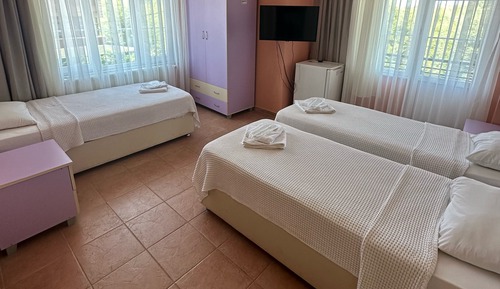 Habitación triple, balcón