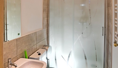 Habitación triple, baño compartido