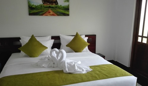 Habitación triple Deluxe, 1 habitación, vistas al jardín, en la zona del jardín