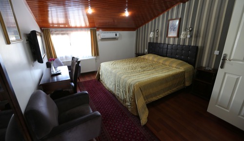 Habitación estándar con 1 cama doble o 2 individuales