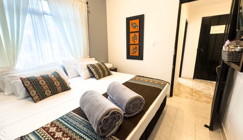 Habitación cuádruple superior, 2 habitaciones, vistas al jardín, en una planta alta