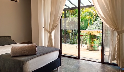 Habitación cuádruple Elite, vistas al jardín