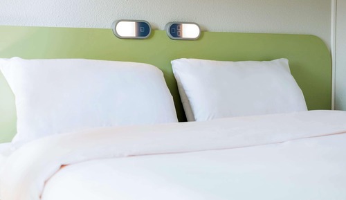 Habitación triple, varias camas