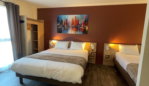 Habitación triple superior, varias camas