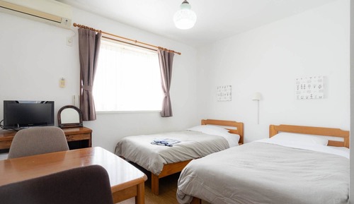Habitación con 2 camas individuales