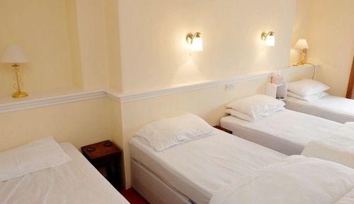 Suite, baño privado (4 Single Beds)