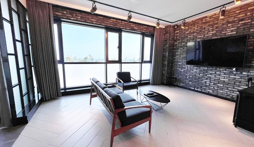 Suite familiar, 2 camas dobles, no fumadores, vistas parciales al mar