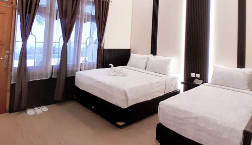 Habitación triple ejecutiva